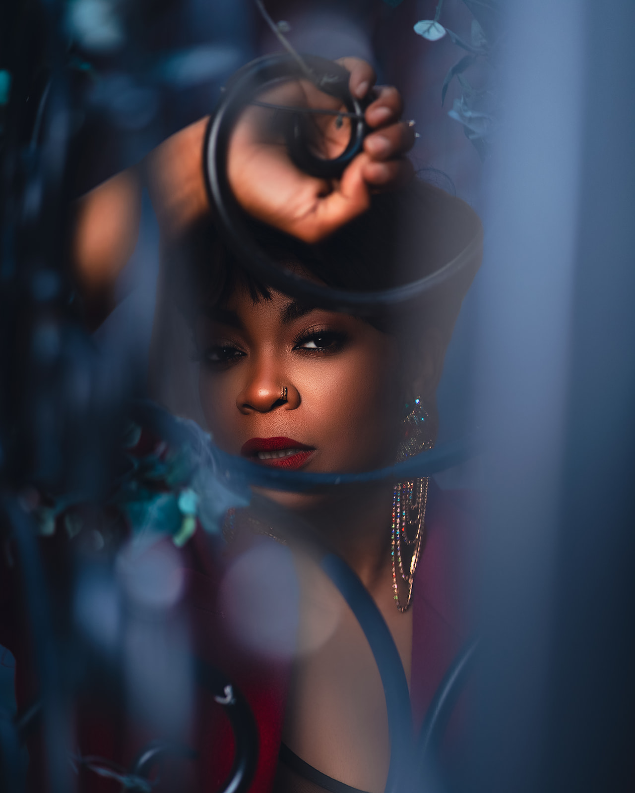 Taliah in a cinematic blue and red portrait